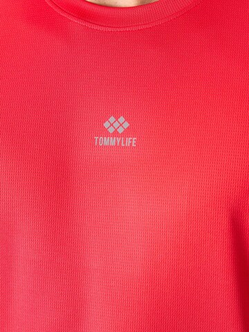 T-Shirt fonctionnel Tommy Life en rouge