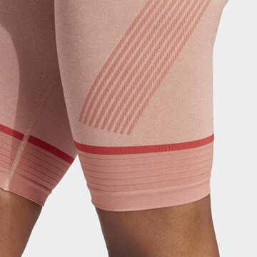 Skinny Pantalon de sport 'True Strength' ADIDAS BY STELLA MCCARTNEY en orange