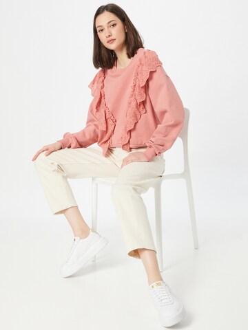 Warehouse Sweatshirt 'Broderie Frill' i rosa