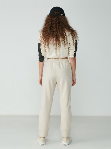 C&City Tapered Trousers in Beige