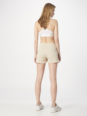 Hummel - regular Pantalón deportivo en beige