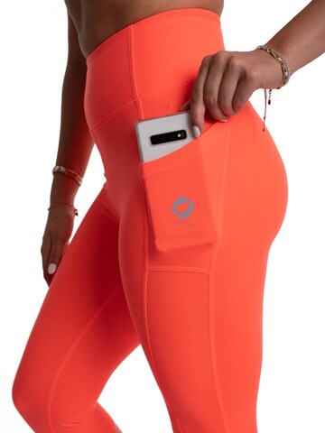 mymotus Skinny Sporthose‌‌‌ in Orange