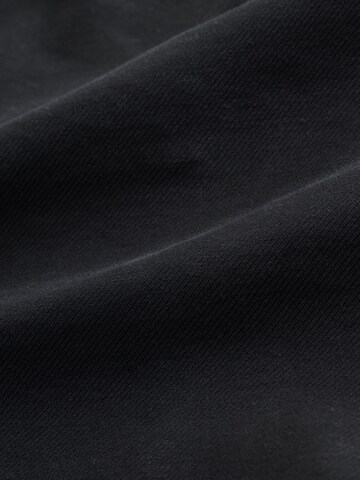 Next Slimfit Hose in Schwarz