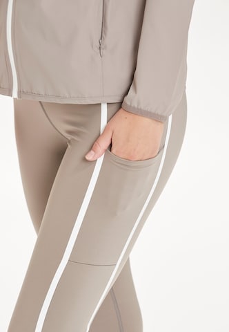 ENDURANCE Skinny Workout Pants 'Flothar' in Brown