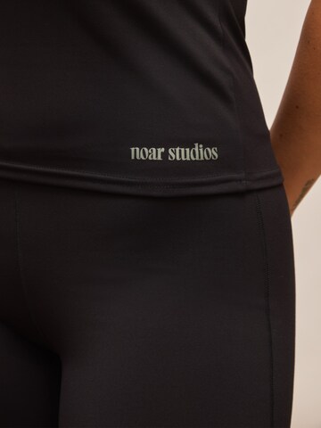 Haut noar studios en noir