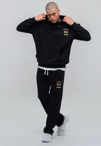 Tom Barron Tracksuit in Black: front