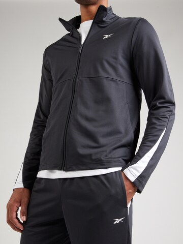 Completo per l'allenamento 'Poly' di Reebok in nero