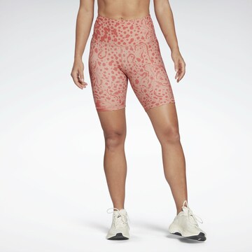 Reebok Skinny Workout Pants in Red: front