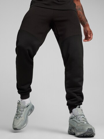 Tapered Pantaloni sport de la PUMA pe negru: față