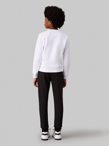 Calvin Klein Jeans - Tapered Calças em preto