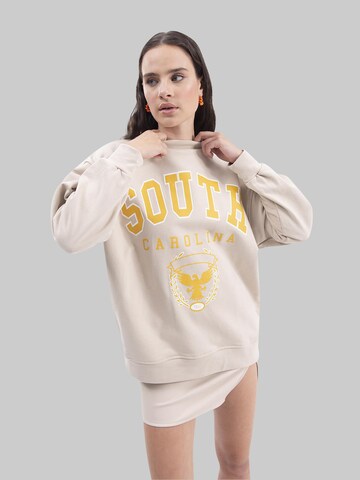 Sweat-shirt FRESHLIONS en beige : devant