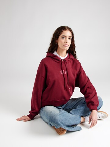 Sweat-shirt 'INT LOGO ABBREV PO HOOD' GAP en rouge