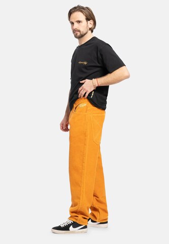 Loosefit Pantaloni di HOMEBOY in arancione