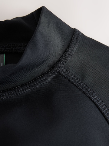 smALLSAINTS - Protección UV en negro