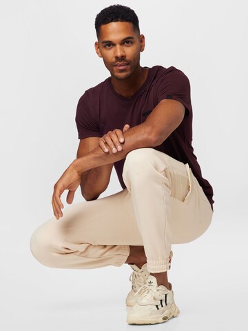 Effilé Pantalon cargo ALPHA INDUSTRIES en blanc