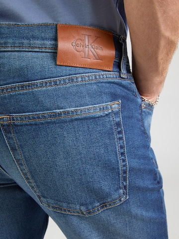 mėlyna Calvin Klein Jeans Siaurėjantis Džinsai