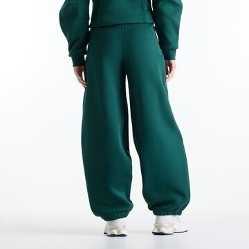 new balance - Loosefit Pantalón en verde