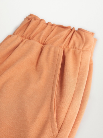 MANGO Szeroka nogawka Spodnie 'Ray-H' w kolorze pomarańczowy