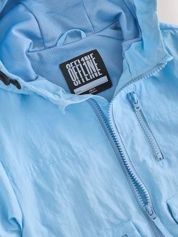 Next Tussenjas in Blauw