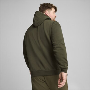 PUMA Спортен суитшърт 'Essentials' в зелено