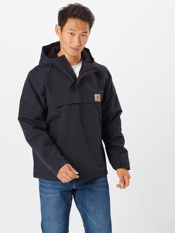 Coupe regular Veste mi-saison Carhartt WIP en noir : devant