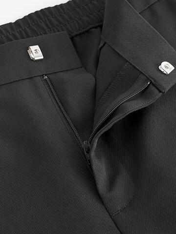 Loosefit Pantaloni chino di Next in nero