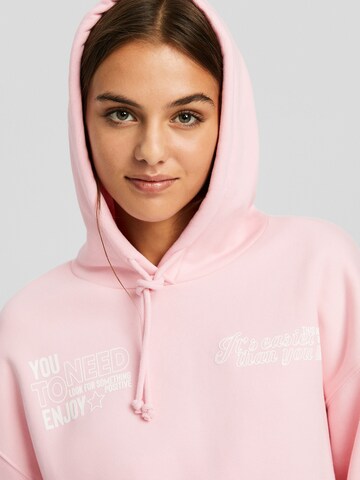 Sweat-shirt Bershka en rose