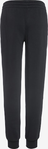 Effilé Pantalon de sport 'CR7 Club Fleece' NIKE en noir