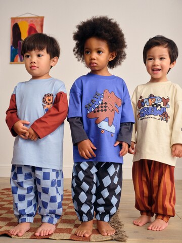 Next Pyjamas i blå: framsida