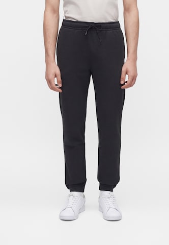 K-Way - Tapered Calças 'PHILBERT' em preto: frente