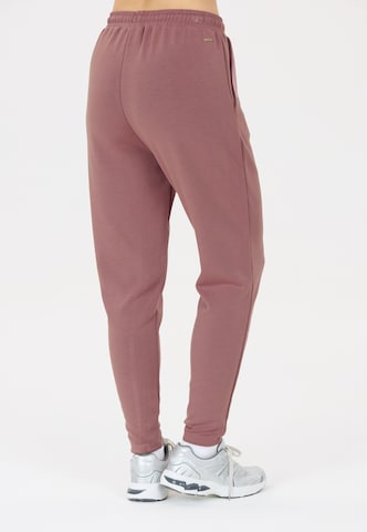 Athlecia Regular Sports trousers 'Jacey' in Red
