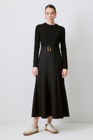Touche Prive Dress in Black: front