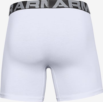 UNDER ARMOUR tavaline Spordialuspüksid 'Charged', värv valge