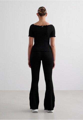 Aim'n Flared Hose in Schwarz