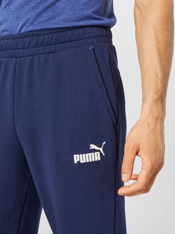 PUMA Tapered Sportsbukser i blå