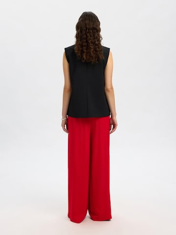 Wide leg Pantaloni di SELECTED in rosso