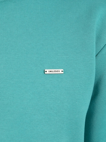 Veste de survêtement Smilodox en bleu