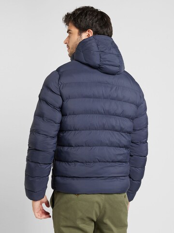 TOMMY HILFIGER Tussenjas in Blauw