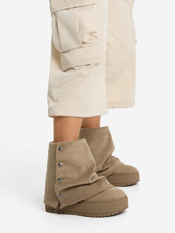 Boots Bershka en beige : derrière