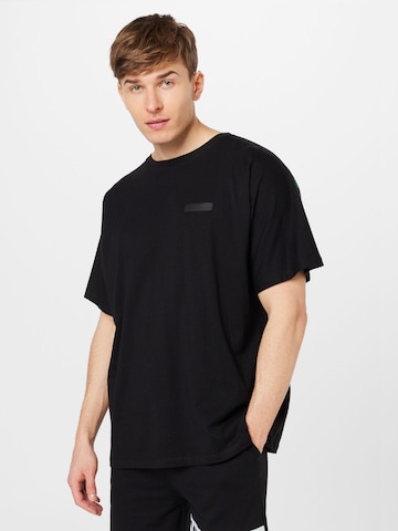 Gianni Kavanagh - Camiseta 'IDGAF' en negro: frente