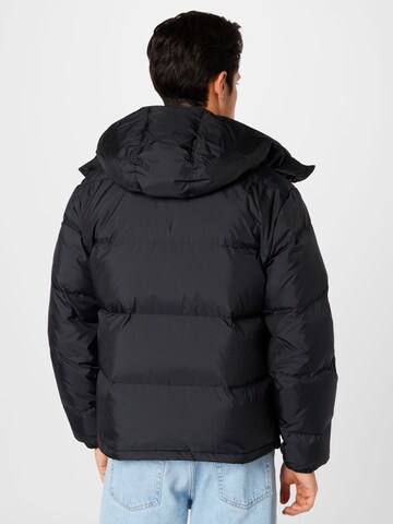 LEVI'S ® Talvitakki 'Hooded Fillmore Short Jacket' värissä musta