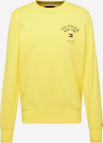 dzeltens TOMMY HILFIGER Sportisks džemperis 'ARCHED VARSITY': no priekšpuses