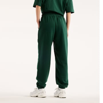 new balance Tapered Broek 'Sport Essentials French Terry Jogger' in Groen