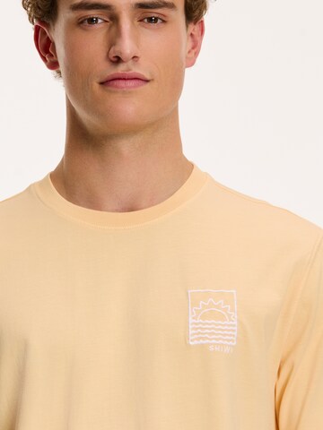 T-Shirt Shiwi en orange