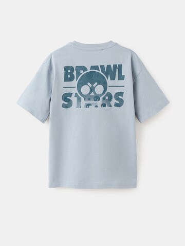MANGO KIDS T-shirt 'BRAWLETS' i blå