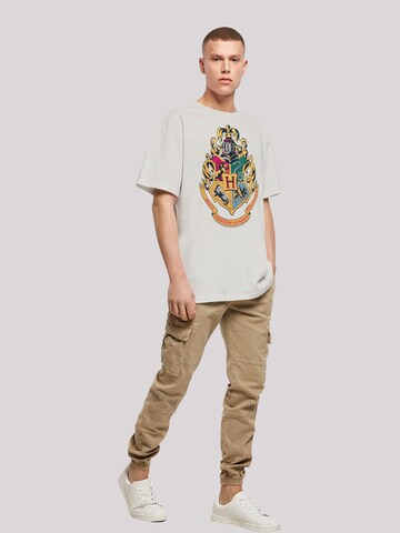 F4NT4STIC Shirt 'Harry Potter Hogwarts Crest Gold' in Grau