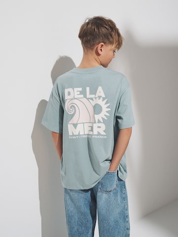 The Set T-shirt i blå: framsida