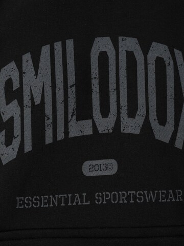 Veste de survêtement Smilodox en noir