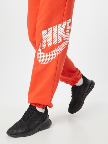 Nike Sportswear Zwężany krój Spodnie 'EMEA' w kolorze czerwony