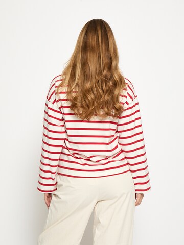 Top 'Nayala' di Peppercorn in arancione